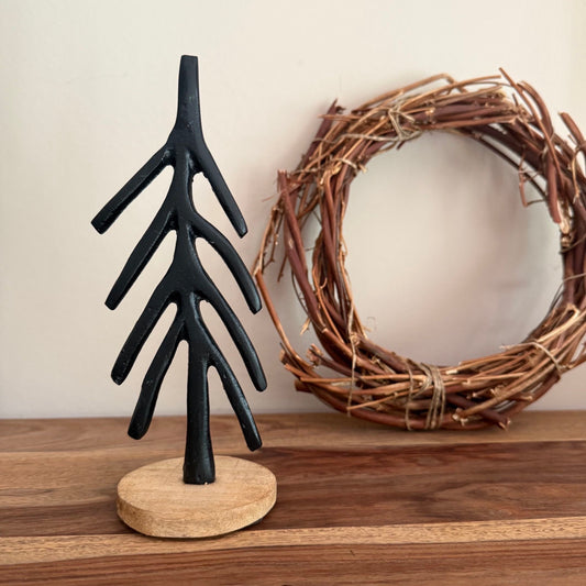 Gußeisenbaum auf Holzfuß